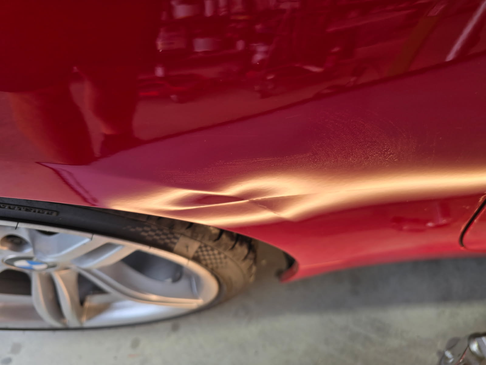 BMW M Coupe quarter panel dent — before
